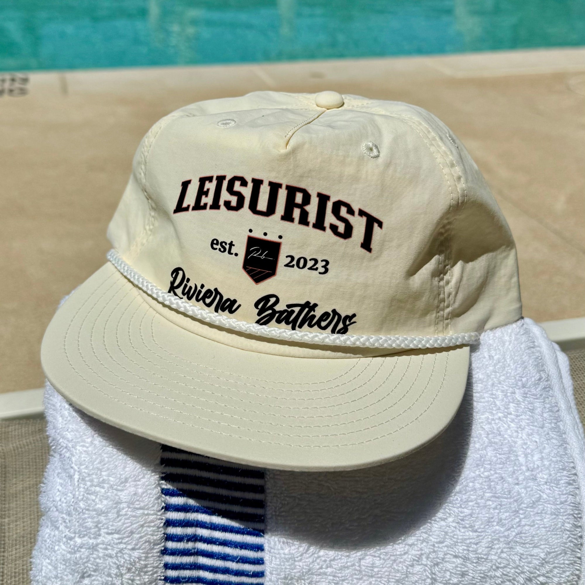 Designer Men’s Resort Wear, Swim Shorts & Luxury Swimwear Accessories | Riviera Bathers | Swim Trunks | Country Club Hat | Cream